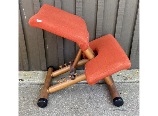Ergonomic Wood Chair With Red Fabric Seats From Balans
