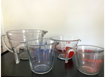 Grouping Of Collectible Pyrex Measuring Cups Including Funky Mid Century Shapes