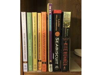 Collection Of Books Including 'the Kite Runner' By Khaled Hosseini