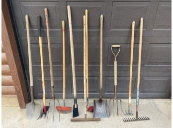 Collection Of Assorted Yard Tools Including Shovels, Pitchforks, Rakes, & More
