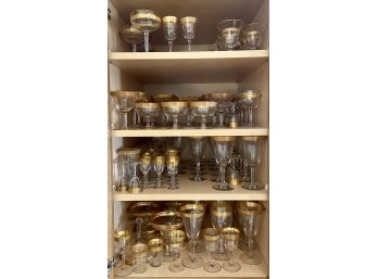 Large Collection Of Gold Encrusted Glassware Including Wine Glasses, Margarita Glasses, Dessert & More
