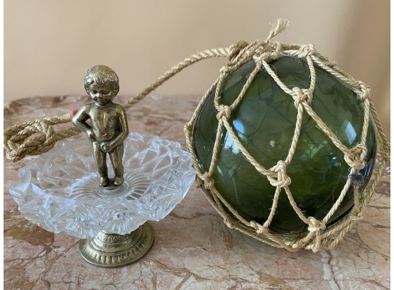 Risque Statue Of Boy Cherub In Glass Ring Dish With Green Globe