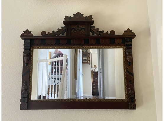 Eastlake Style Antique Rectangular Mirror With Wood Carvings And Varied Wood Tones