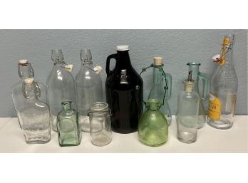 Assorted Collection Of Glass Bottles, Pitchers, & Jugs