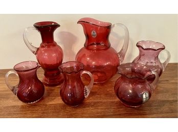 Collection Of (6) Assorted Fenton Pitchers