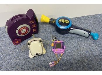 Assorted 90s Toys Including Bop It