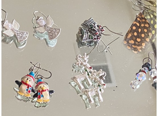 Collection Of Festive Holiday Earrings Featuring Angels, Snowmen, Reindeer, And More!