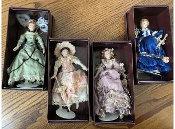 Victorian Trading Co. Collection Of 4 Dolls With Silk Dresses