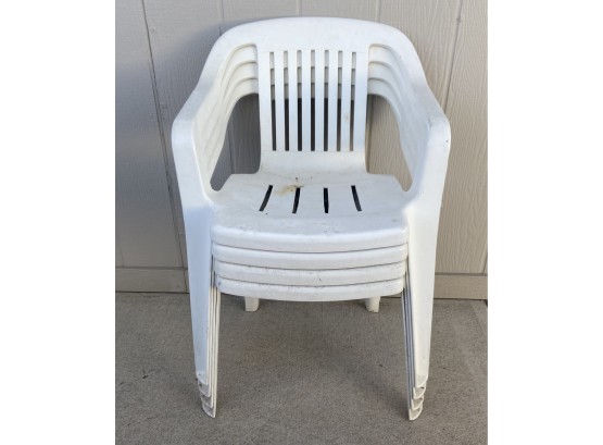 (4) Plastic Outdoor Chairs