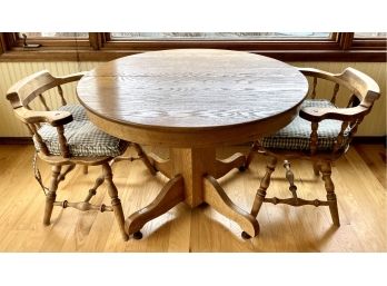 Oak Table With 2 Captains Chairs.