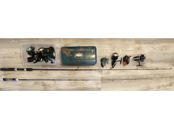 Collection Of Assorted Fishing Items Including Rods, Reels, And Tackle Box