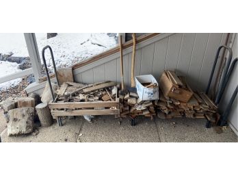 Large Pile Of Firewood With Axe And Sledge Hammer