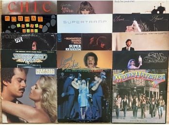 (15) Assorted Vinyl Records Including Stevie Nicks, Eric Clapton, & More