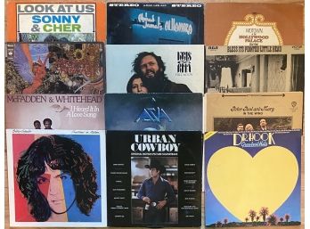 (12) Assorted Vinyl Records Including Asia, Billy Squier, & More