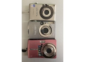 (3) Late Model Polaroid And Canon Cameras