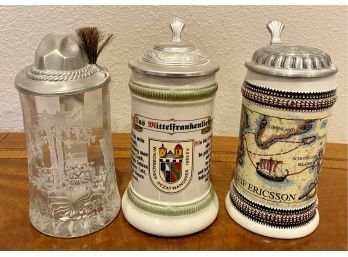 (3) Assorted Steins With Metal Lids