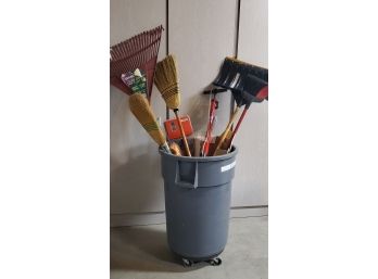Large Plastic Trash Can With Assorted Rakes, Brooms, Tire Pump And More