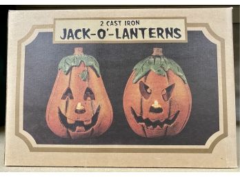 Two Cast Iron Jack O Lanterns