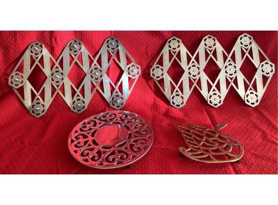 Two Trivets And Two Flextrays By Northington