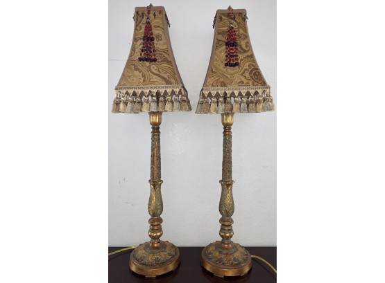 Two Tall Tuscan Gold Leaf Lamps With Gold Shades And Tassels