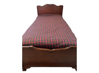 Lovely Twin Bed With Floral Carving And Plaid Comforter (1 Of 2)