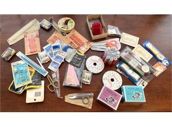 Large Sewing Collection Including A Box Of Patterns, Ruffle Maker, Pins, Needles, Thread, Trim, And More