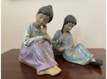 Set Of 2 Ceramic Figures Of Ladies Sitting Down