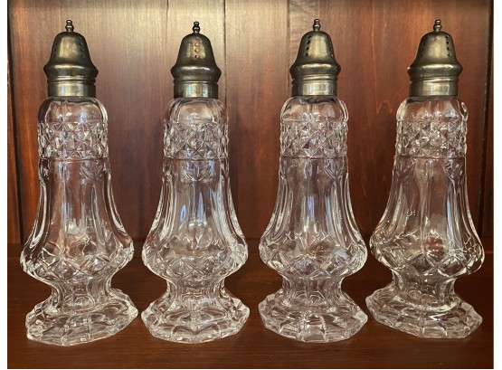 Four Master Sugar Shakers With Silver Plate Tops