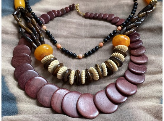 Beautiful Trio Of Necklaces With Carved Wood, Bone, And Large Amber Piece From Kenya