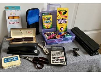 Collection Of Office Supplies Including Stapler And Hole Punch