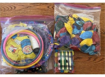 Collection Of Kids Party Supplies Including Balloons, Crayons, & Disposable Plates