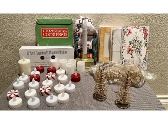 Collection Of Holiday Decor Candles And Cards