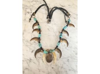 Sterling Silver, Turquoise And Animal Claw Necklace With Braided Leather Strap
