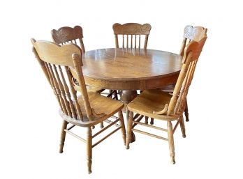 Solid Oak Round Dining Table With Two Extra Leaves And Four Chairs