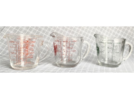 Three Measuring Cups One From Pyrex And 2 Oven Basics