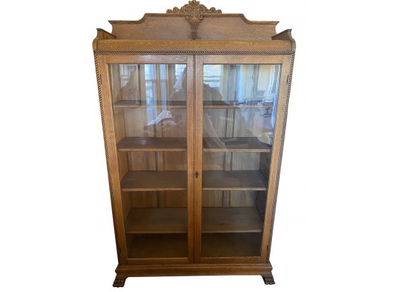 Beautiful Glass Front Footed Curio Library Cabinet With Intricate Barley Twist Carving And Carved Urn Relief