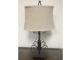 Great Iron Scrollwork Lamp With Oatmeal Colored Shade