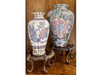 Two Floral China Vases On Wooden Stands