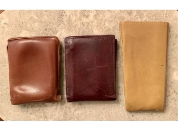 Two Leather Wallets And Faux Leather Pencil Pouch
