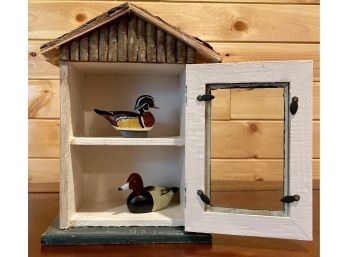 Small House With Two Ducks