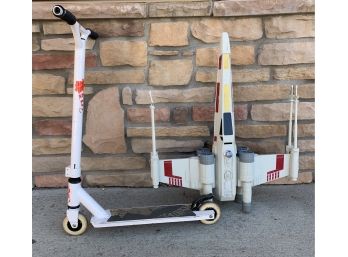 Royal Childrens Scooter And A Plastic Star-wars Fighter Jet