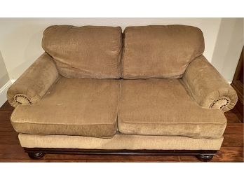 Light Brown Love Seat With Round Studded Arms By Ashley Furniture