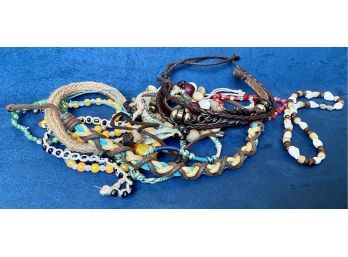 Lot Of Misc String And Beaded Cord Bracelets