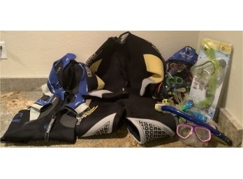 Large Collection Of Goggles, Two Kids Wet Suits, & One Adult Wet Suit