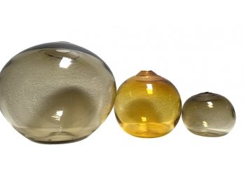 Collection Of Three Soko Glass Balls In Yellow And Smoked Glass