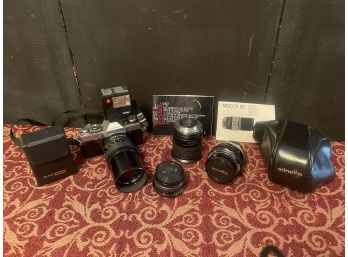 Minolta XG 1 Film Camera With Attachable Flash And Four Lenses