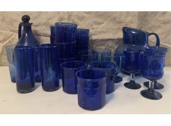 Beautiful Blue Glass Cups And Pitchers Of Many Sizes, Shapes, & Shades