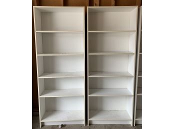 2- Five Tier Particle Board Shelves. (1of 2)