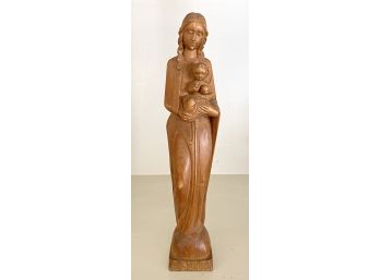 Wooden Figurine Of Mother And Child