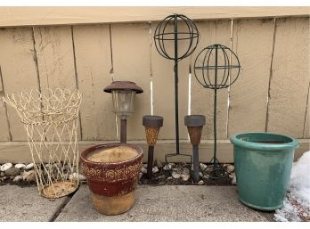 A Small Collection Garden Decor And Pots